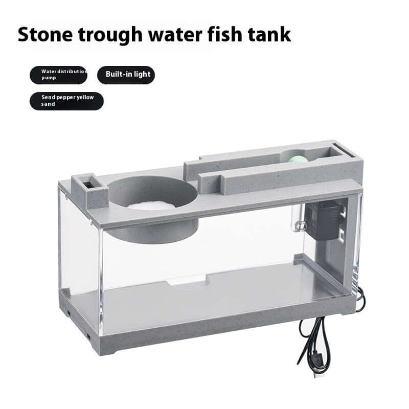 Aquarium miniature en béton avec lumière intégrée et pompe à eau, parfait pour petits espaces.