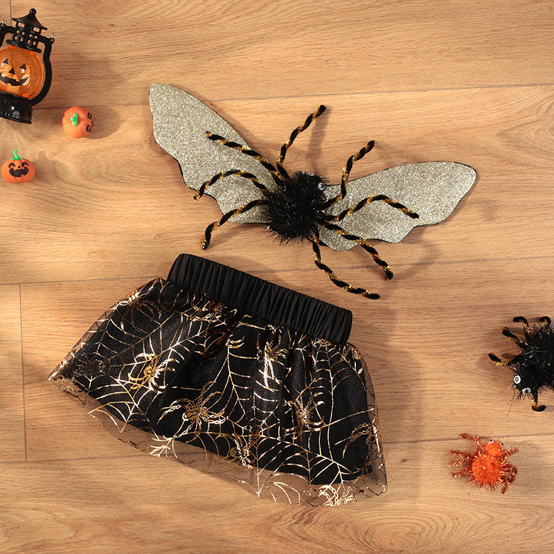 Costume Halloween pour chien avec jupette noire et ailes d'araignée scintillantes, parfait pour les célébrations.