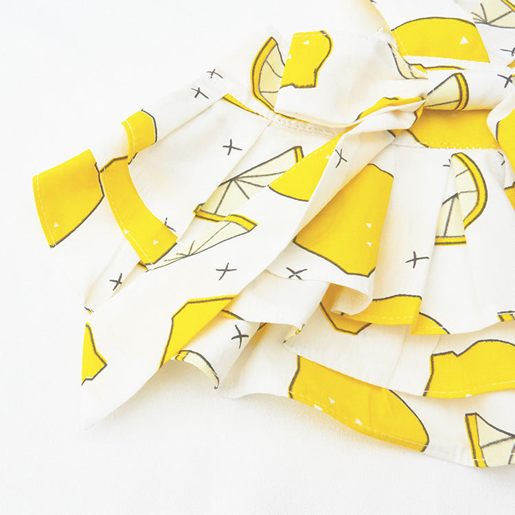 Jupe en coton imprimé avec motif de citrons jaunes, idéale pour chiens et chats, couture élégante pour animaux de compagnie.