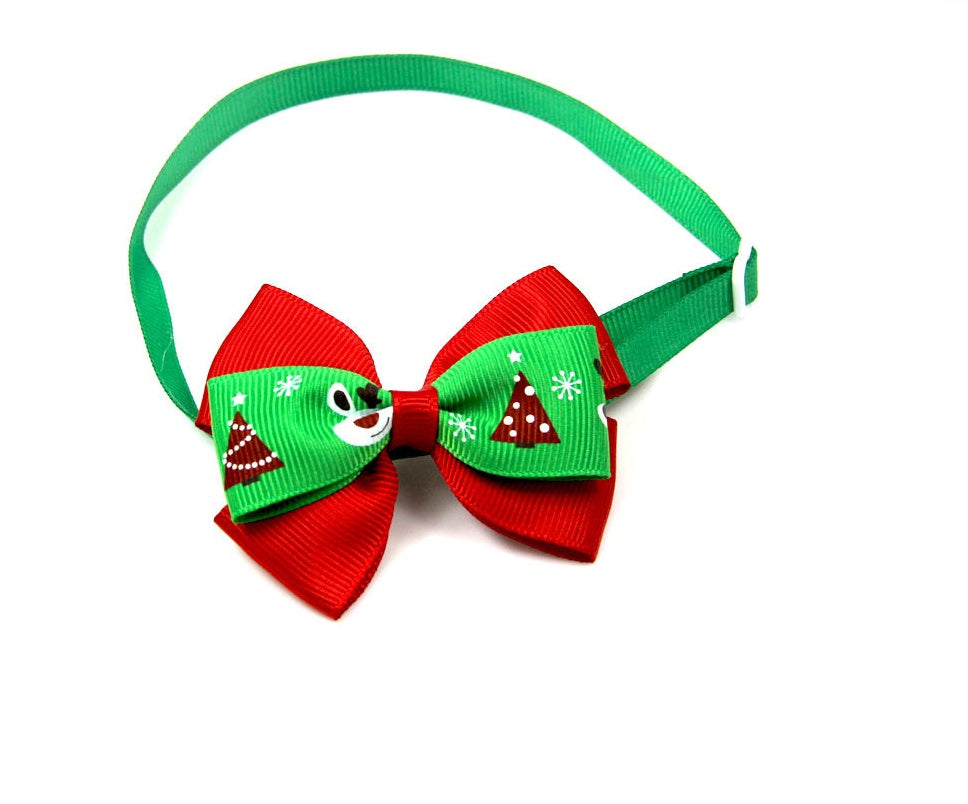 Nœud papillon de Noël pour animaux de compagnie en rouge et vert, conçu pour les fêtes et les occasions spéciales.