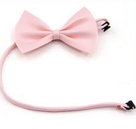 Nœud papillon rose pour animaux, accessoire élégant pour chiens et chats, parfait pour toutes les occasions.