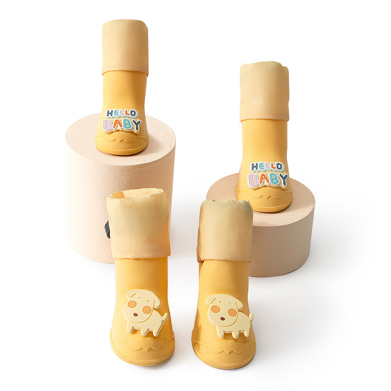 Bottes pour chiens Cartoon jaunes imperméables avec motifs amusants, idéales pour protéger les pattes de votre chiot.
