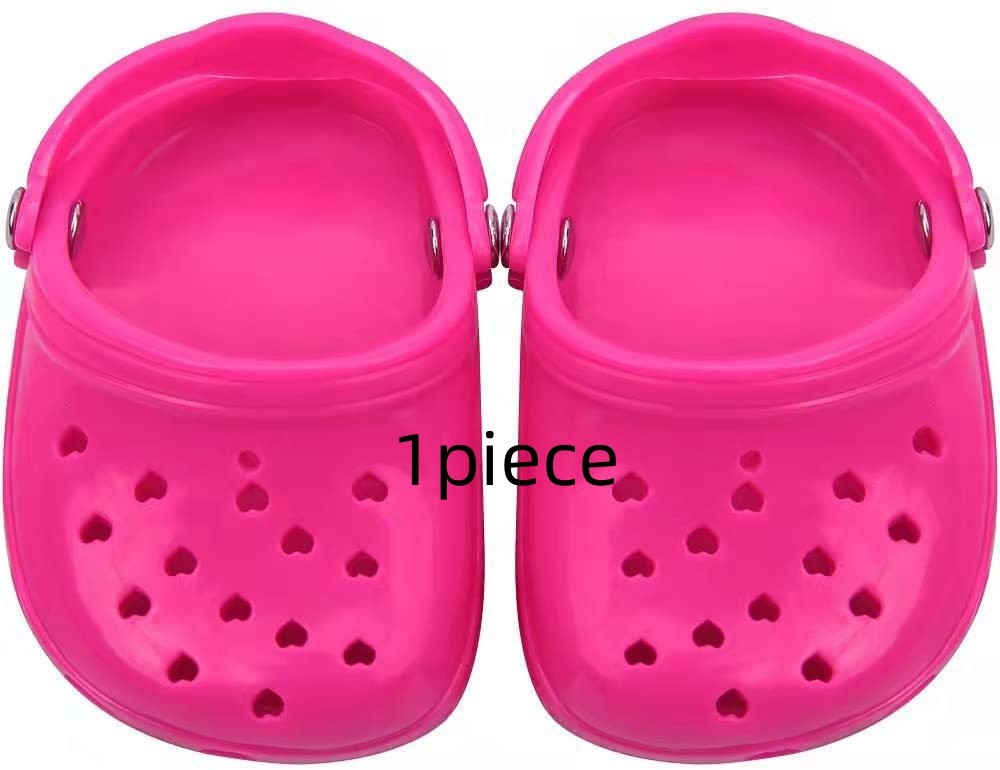 Chaussures pour chien en silicone rose, résistantes à l'usure, avec coeurs pour protection des pattes.