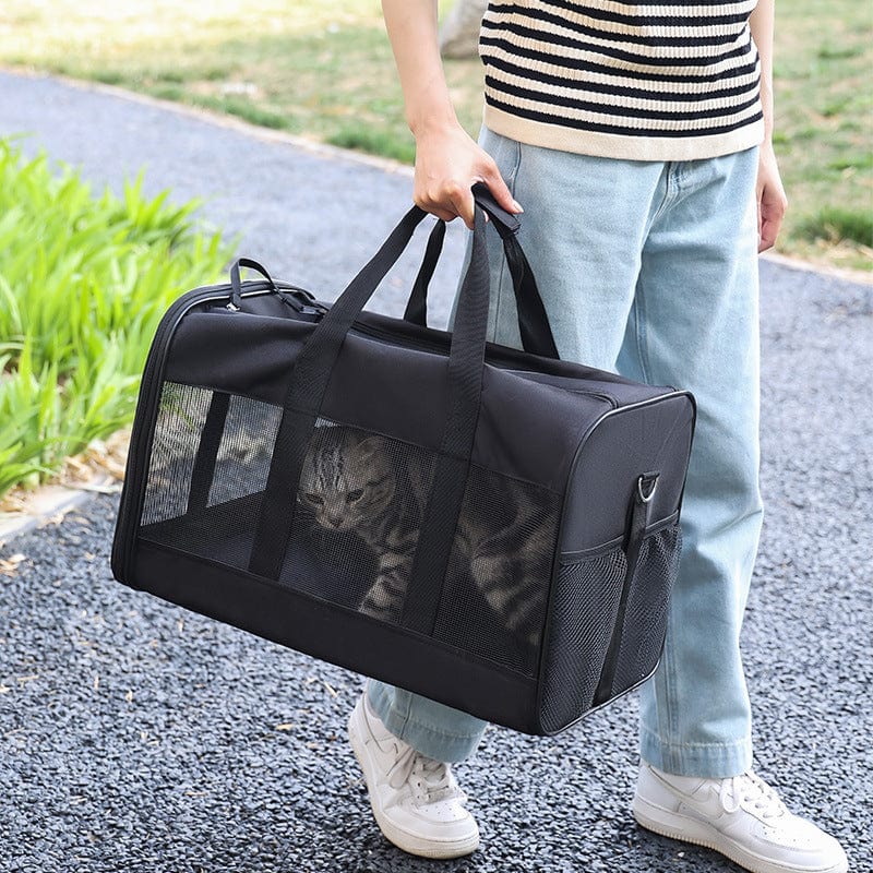 Sac de transport pour animaux de compagnie noir, idéal pour voyager avec votre chat, léger et durable.