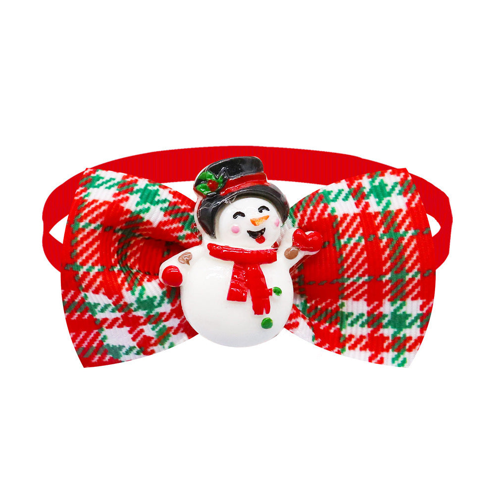 Nœud papillon en plaid avec un bonhomme de neige, idéal pour chiens et chats pour les fêtes de Noël.
