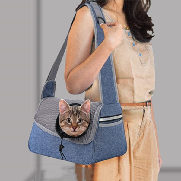 Sac à bandoulière respirant et léger avec un chat à l'intérieur, parfait pour le confort des animaux.