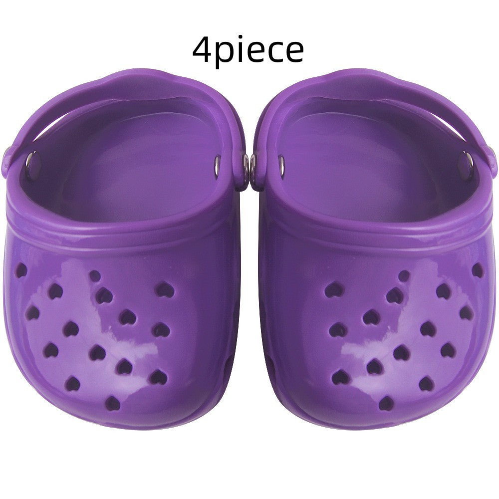 Chaussures pour chien en silicone violet, 4 pièces, résistantes à l'usure, design chic pour protection des pattes.