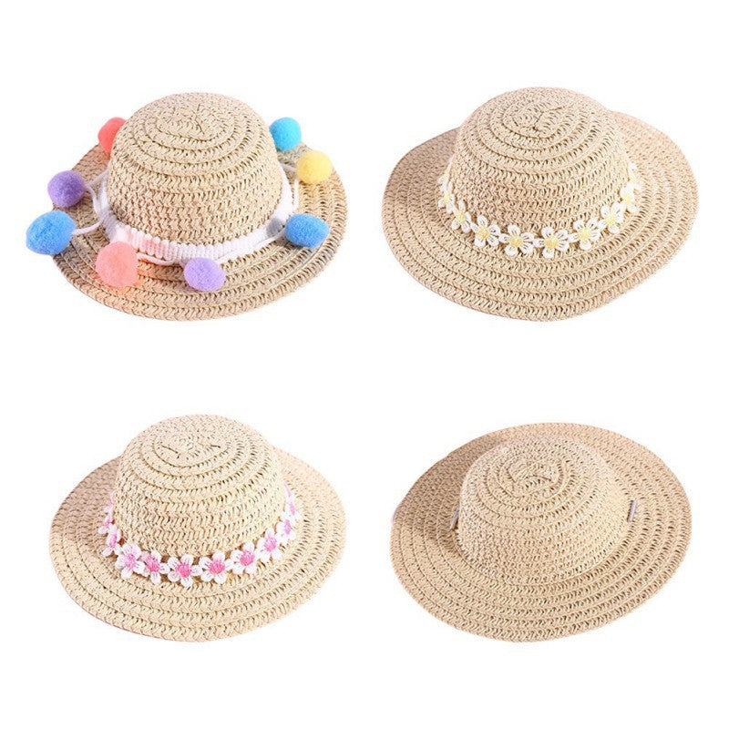 Chapeaux en paille pour animaux, avec pompons et fleurs, disponible en plusieurs styles et couleurs.