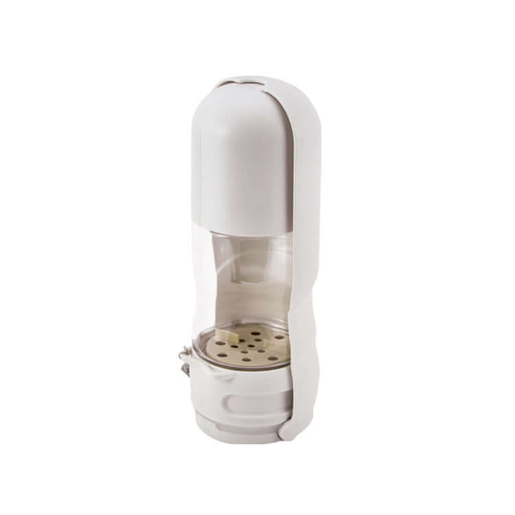 Bol portable pliable pour chiens avec fontaine intégrée, idéal pour l'hydratation en plein air.