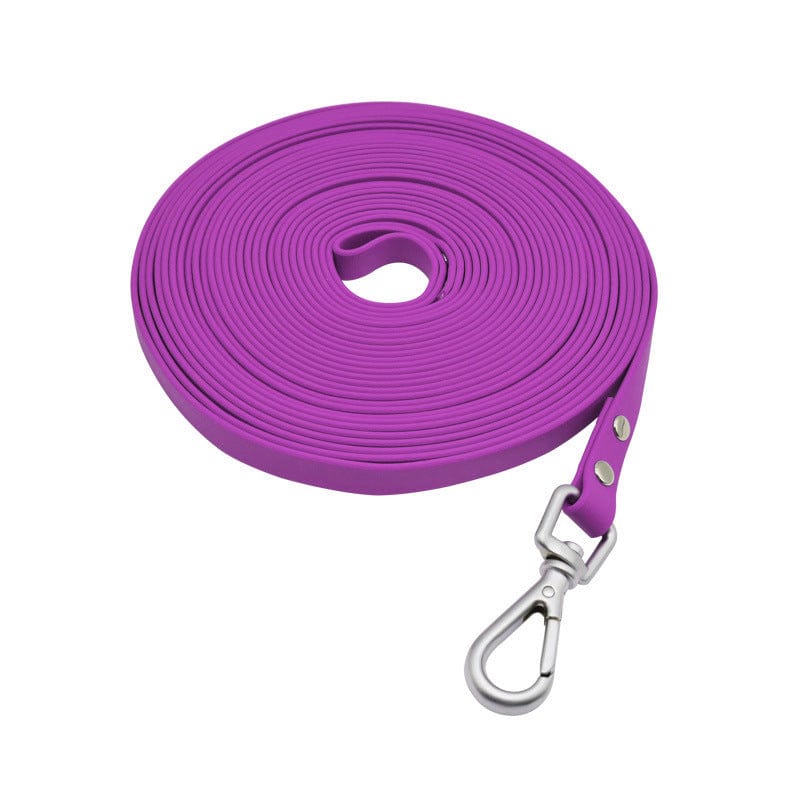 Laisse étanche en PVC pour chiens, coloris violet, idéale pour promenades et aventures en plein air.