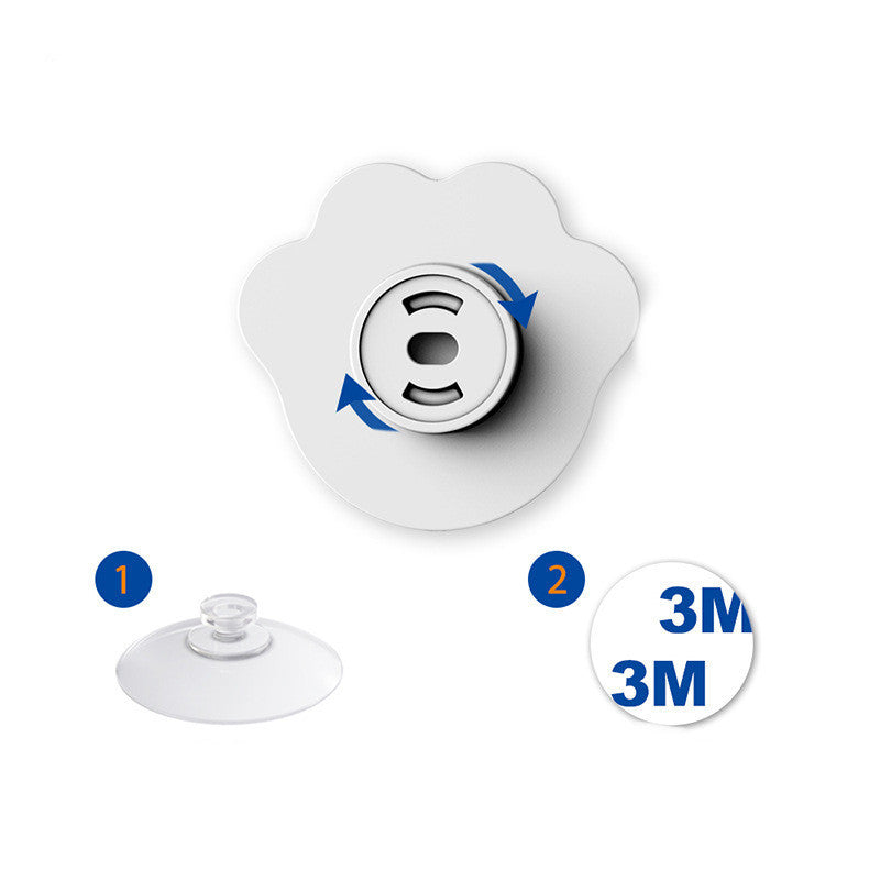 Distributeur d'eau pour animaux avec capteur infrarouge et base adhésive en silicone, facile à installer.