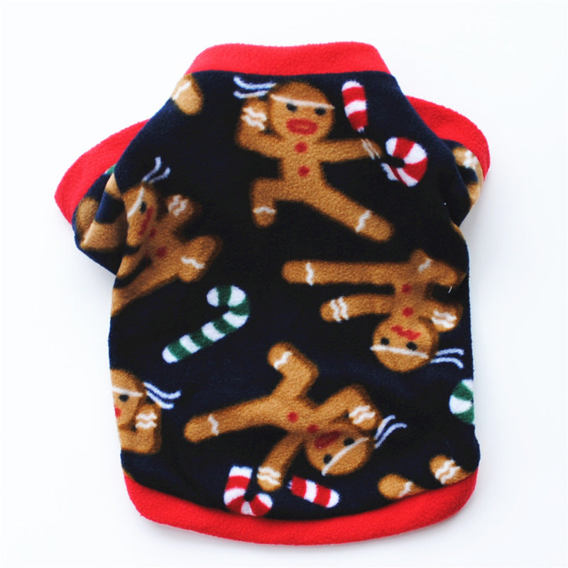 Vêtement de Noël pour chien en polaire douce avec motifs de bonhommes en pain d'épice et cannes en sucre.