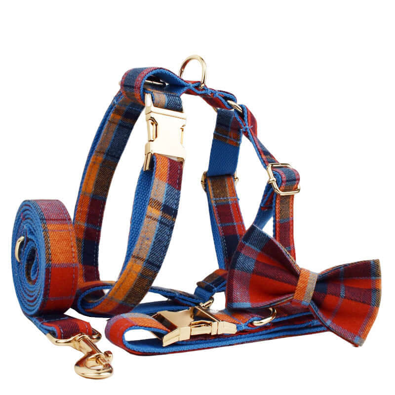 Collier pour chien avec nœud élégant et laisse assortie en tissu piqué bleu et rouge.