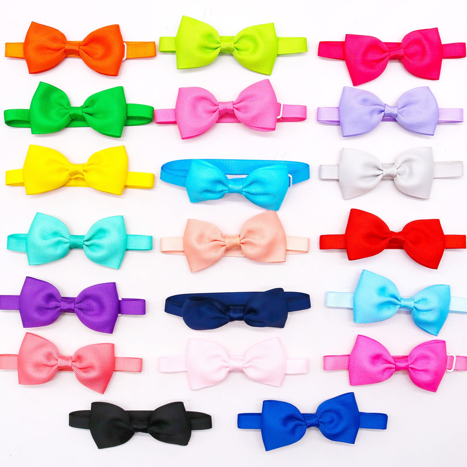 Collection of colorful adjustable bow ties for pets in various shades, perfect for stylish dogs and cats.