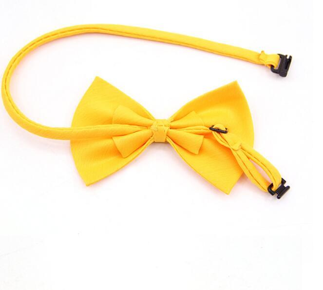Nœud papillon jaune pour animaux, élégant et simple, idéal pour chiens et chats, accessoire en coton biologique.