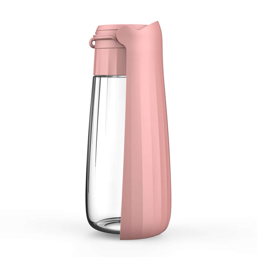 Gourde pour chien pliable de 550ml en silicone rose, idéale pour les activités de plein air et l'hydratation des animaux.
