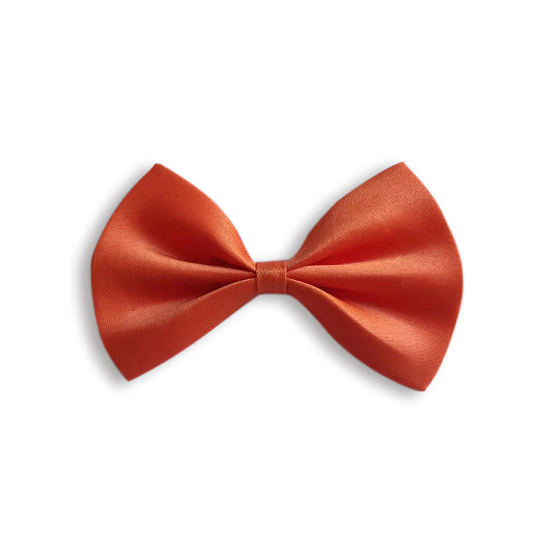 Nœud en satin orange, parfait pour les accessoires pour animaux comme collier ou vêtements pour animaux.