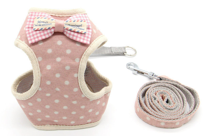 Harnais de traction pour chat en coton biologique à pois roses avec laisse assortie, idéal pour promenades sécurisées.