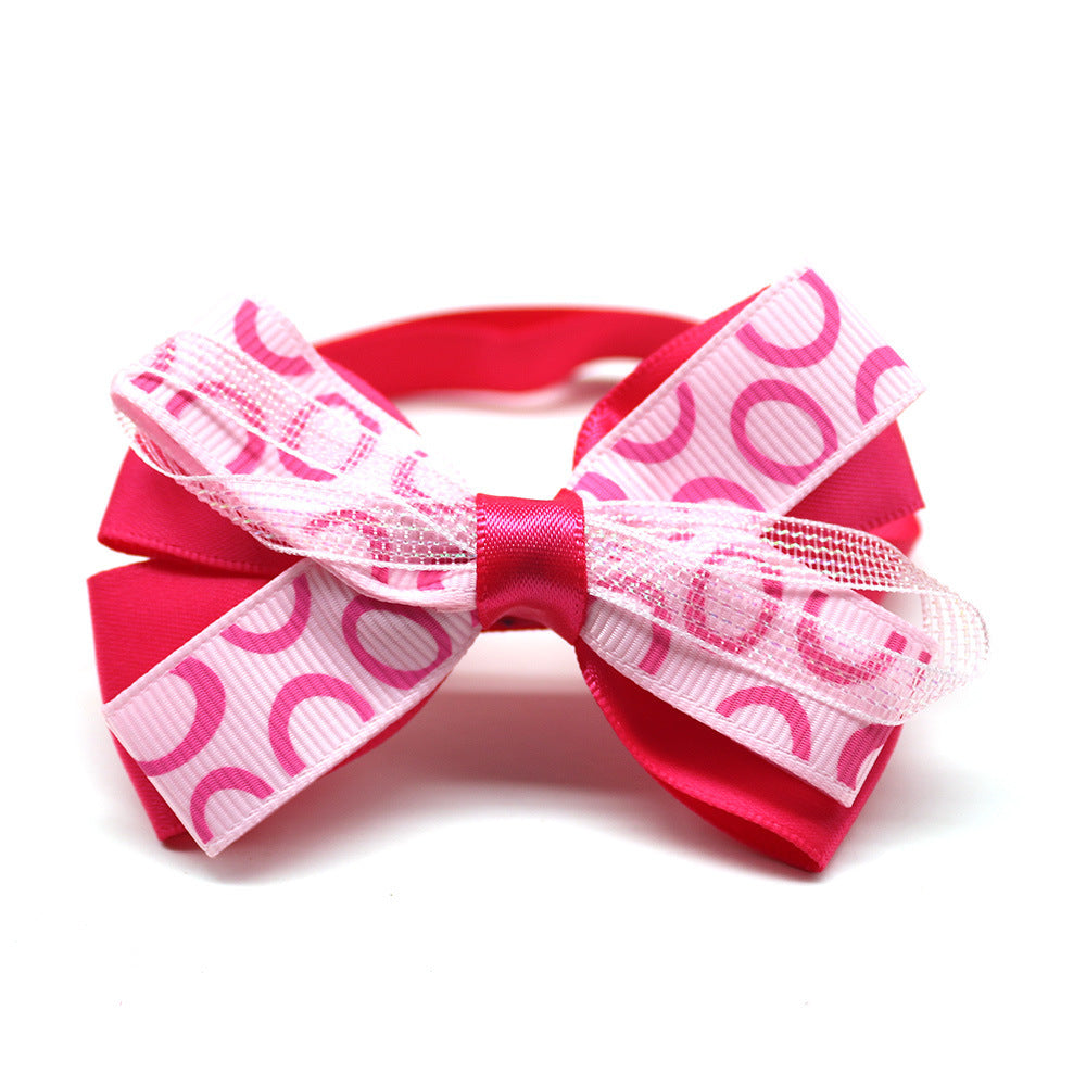 Nœud papillon rose pour chiens et chats, accessoire élégant en polyester, idéal pour occasions spéciales.