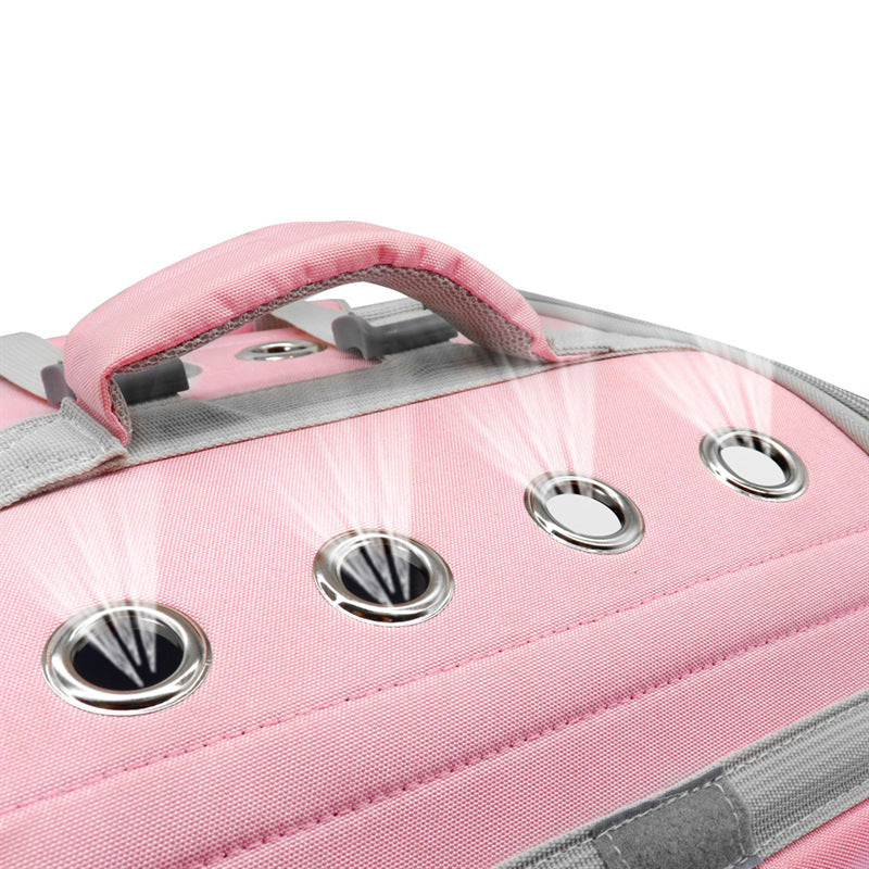 Sac à dos de transport pour chat en rose avec aérations pour une meilleure circulation de l'air.