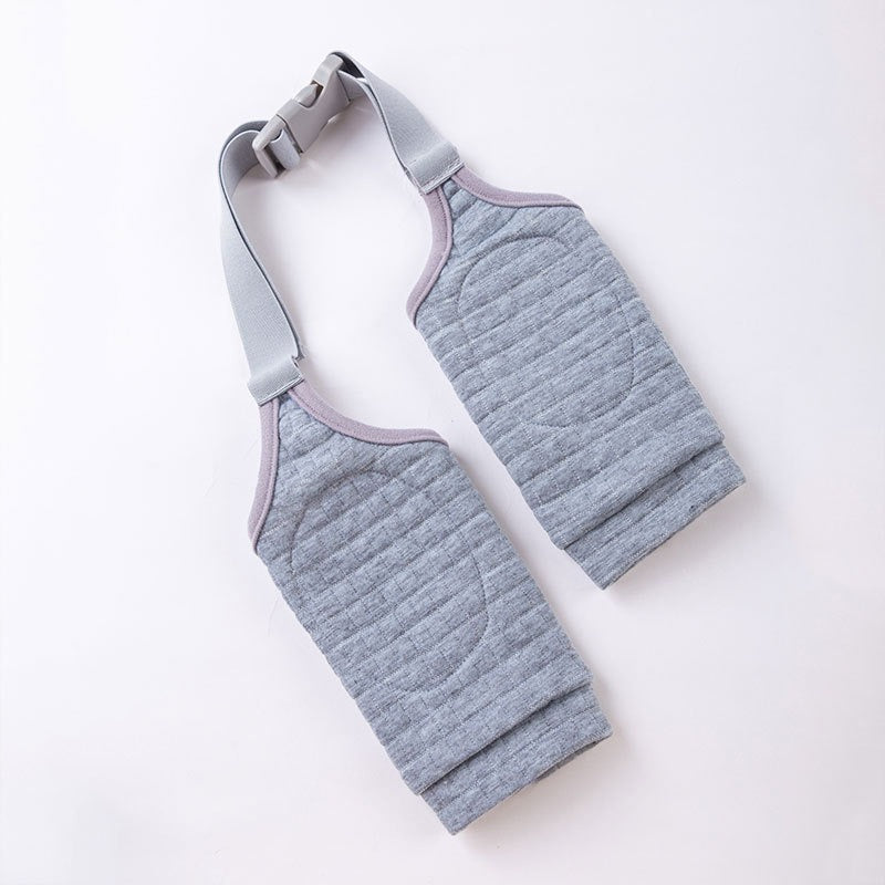Protection des genoux pour chiens en tissu doux avec écharpe grise, confortable et stylée.