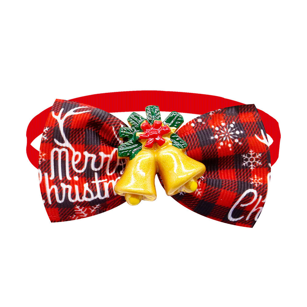 Nœud papillon en plaid rouge et noir pour chiens et chats avec clochettes dorées, accessoire festif.