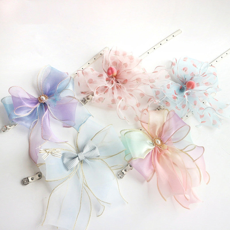 Ensemble de nœuds en tulle coloré, parfaits pour acessoires d'animaux ou décorations festives.