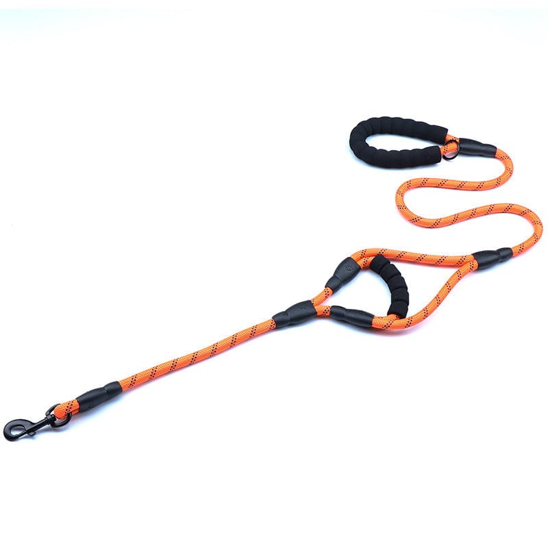 Ceinture de traction en nylon orange avec poignée confortable pour promenades de chien.