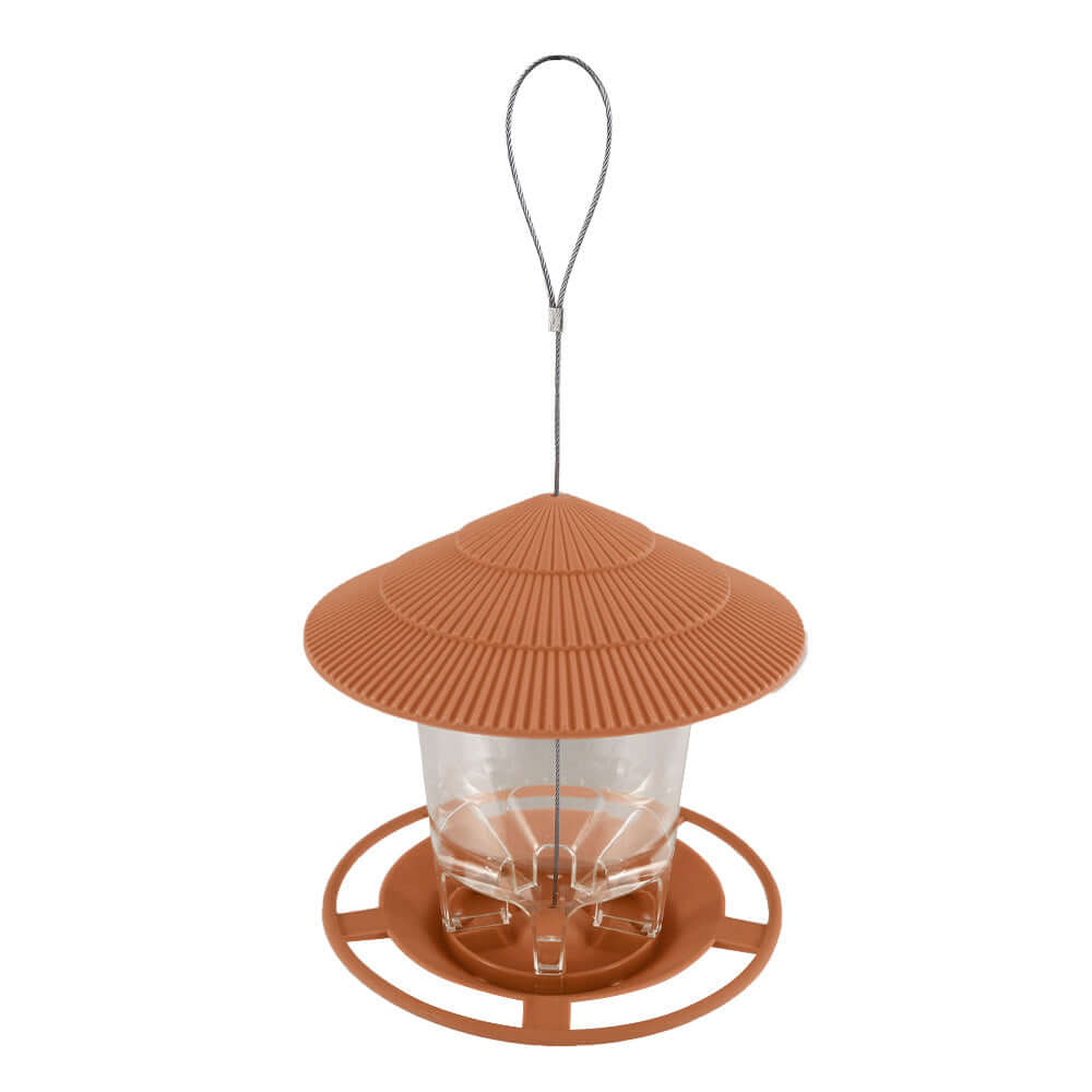 Suspended metal bird feeder in earthy brown, designed for outdoor garden use, attracting wildlife beautifully.